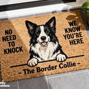 May include: A rectangular doormat with a Border Collie illustration. The mat is tan with black text that reads "NO NEED TO KNOCK" and "WE KNOW YOU'RE HERE." Below the dog is the text "- The Border Collie -."