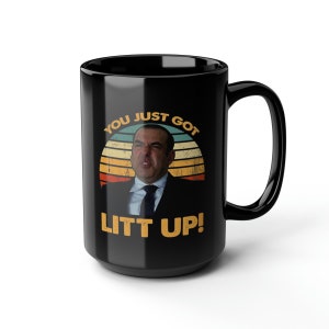 May include: Black ceramic mug with a retro-style graphic of a man with the text "You Just Got Litt Up!"