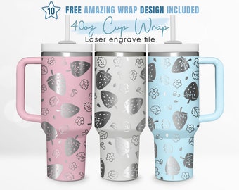 May include: Three 40 oz stainless steel tumblers with handles and lids. The tumblers are pink, gray, and blue with a silver metallic strawberry and leaf pattern.  The text "FREE AMAZING WRAP DESIGN INCLUDED" and "40oz Cup Wrap Laser engrave file" is at the top of the image.