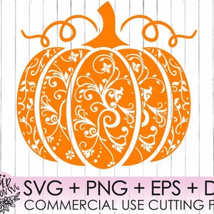 May include: Orange pumpkin with a white floral design. The pumpkin is outlined in black and has a stem at the top. The text "SVG + PNG + EPS + DXF" and "COMMERCIAL USE CUTTING FILES" is below the pumpkin.
