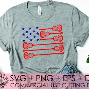 May include: Gray t-shirt featuring a red and blue lacrosse-themed American flag design. The flag design replaces the stripes with lacrosse sticks and the stars with blue stars. The shirt also has the text "SVG + PNG + EPS + DXF COMMERCIAL USE CUTTING FILES".