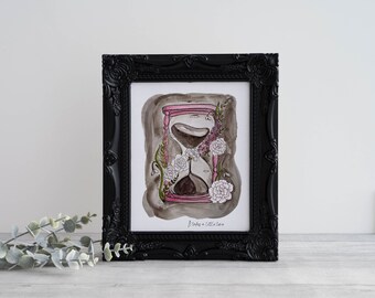 Hour glass art print stating “it takes time”