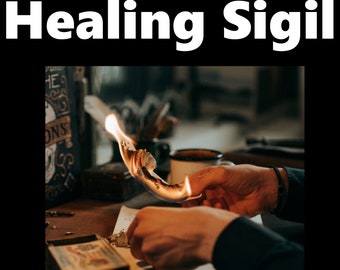 May include: A person's hand holds a piece of paper that is burning with a flame. The paper is curled and has a dark brown color. The person is wearing a dark blue shirt and a bracelet on their wrist. The background is blurry and out of focus.
