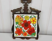 Vintage Cast Iron Trivet, Red Flowers