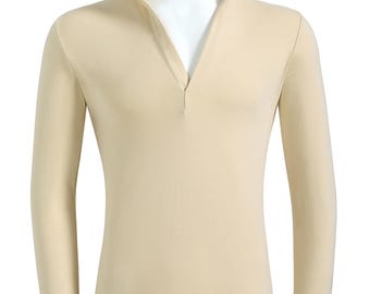 May include: A beige long-sleeved shirt with a mock neck and a zipper closure.