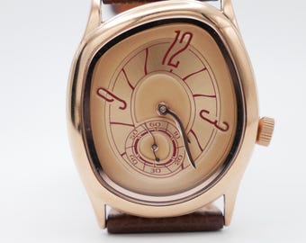 Reloj de inspiración vintage para hombre con correa de cuero marrón y oro rosa.