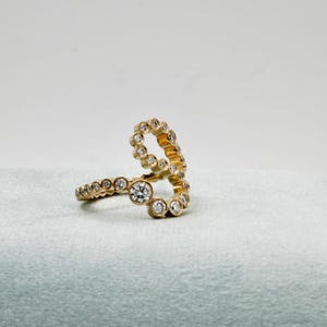 The 18K Alphabet Embrace Ring (Q-X) image 7