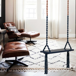 Wooden indoor swing for adults and kids with wide comfortable seat. Stylish color combination. Unique garden swings and porch decor