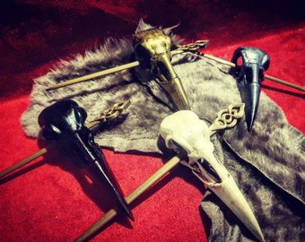 3D printed, customizable, hand-painted crow skull hairpin.