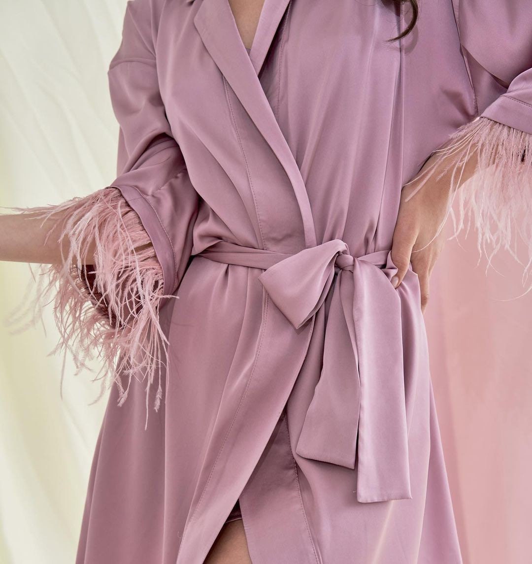 white silk robe with feathers