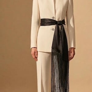 May include: A rustic wooden sign with the text "Welcome to our home" in white lettering. The sign features a distressed finish and a simple, inviting design, perfect for entryway decor.