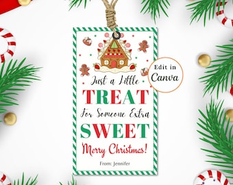 May include: A printable Christmas gift tag with a gingerbread house illustration and the text "Just a Little Treat for Someone Extra Sweet Merry Christmas! From: Jennifer". The tag has a green and red striped border.