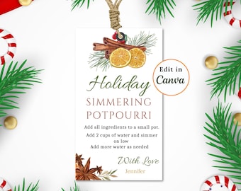 May include: A printable gift tag featuring a watercolour illustration of cinnamon sticks, orange slices, and star anise. The text reads "Holiday Simmering Potpourri" and includes instructions for making the potpourri. The tag also includes the text "With Love, Jennifer".