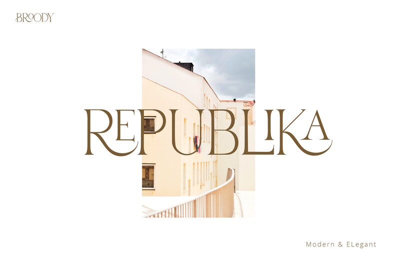 May include: A graphic design for a brand called "Republika" in a brown serif font. The text is set against a background of a building with a balcony and a cloudy sky.