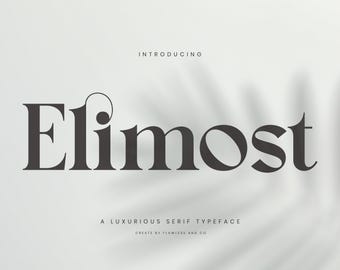 Könnte beinhalten: Grafikdesign mit dem Wort "Elimost" in einer dunkelgrauen Serifenschrift. Der Text "Introducing" steht darüber, und "A Luxurious Serif Typeface" und "Create by Flawless and Co" stehen darunter. Der Hintergrund ist hellgrau mit einem dezenten Blattschatten.