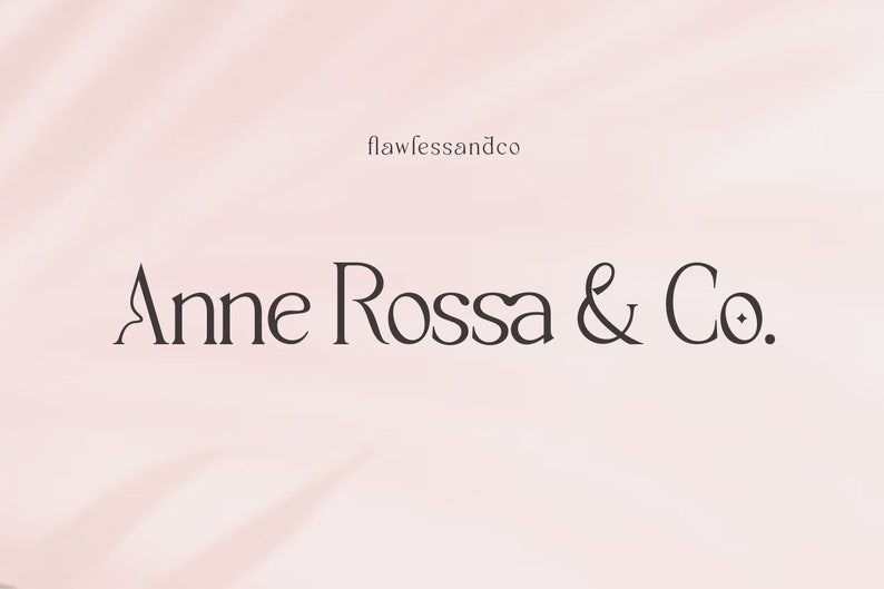 May include: A logo for a business called "Anne Rossa & Co.". The logo is in a minimalist style with a simple font and a stylized ampersand.
