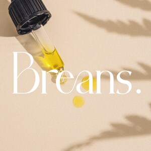 May include: A dropper bottle with a clear glass dropper and a black cap. A drop of yellow liquid has been dispensed onto a beige surface. The word "Breans." is written in white text on the surface.