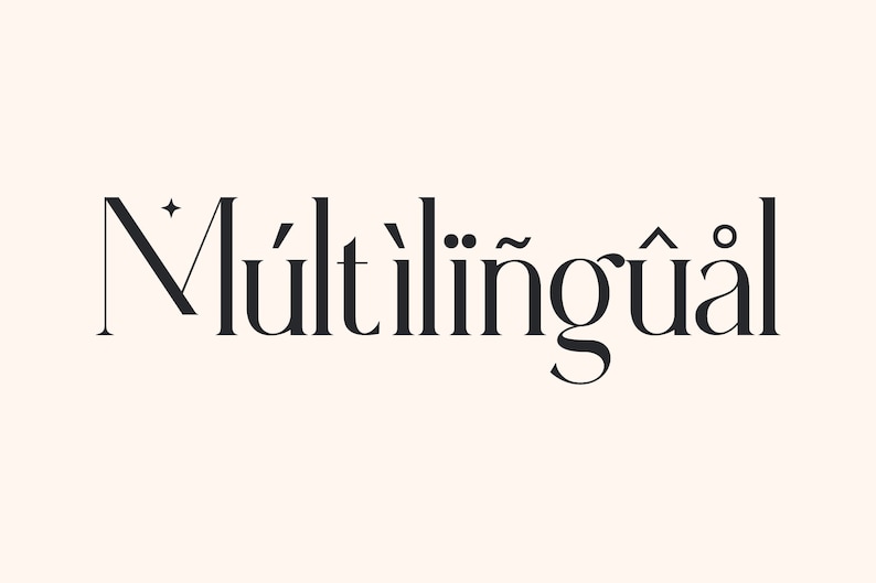 May include: Black and white text logo with the word "Multilingual" in a stylized font.