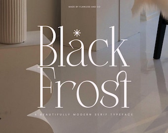 May include: A minimalist image featuring the words "Black Frost" in a modern serif typeface. The text is in white against a neutral, light brown background. The phrase "A beautifully modern serif typeface" is below the main text.