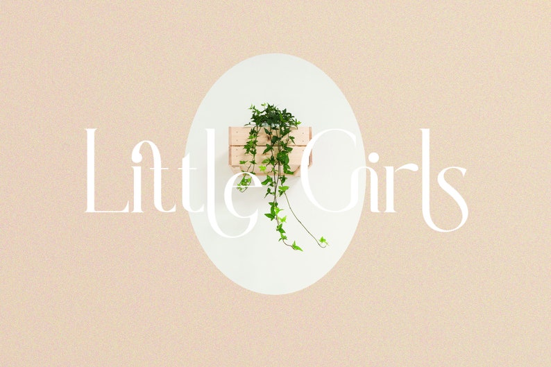 May include: A white oval with the text "Little Girls" in a decorative font. A small wooden crate with a green plant growing out of it is inside the oval.