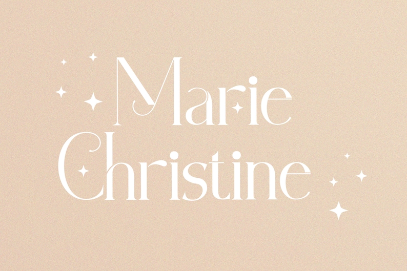 May include: A beige background with the name "Marie Christine" written in white cursive font with small white stars scattered around the text.