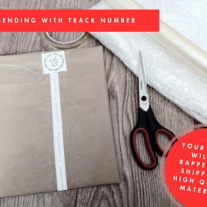 May include: A brown paper package sealed with a white ribbon and a "made with love" sticker. Black and red scissors, tape, and bubble wrap are also visible. Text reads "SENDING WITH TRACK NUMBER."