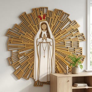 May include: Wooden wall art depicting a religious figure with a crown, hands clasped in prayer, and a rosary. The figure is in white, set against a gold and brown sunburst design. A decorative piece for home decor.