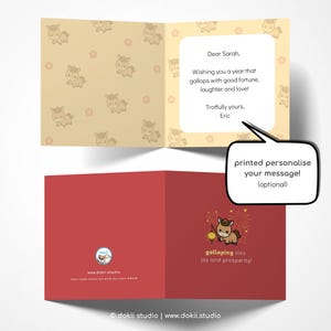May include: A greeting card with a red cover and a tan interior. The interior has a repeating pattern of cartoon horses. The cover features a cartoon horse with fireworks and the text "Galloping into joy and prosperity!"