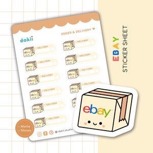 Puede incluir: Una hoja de pegatinas con 10 etiquetas coloridas que representan una caja de eBay de dibujos animados con el texto "DELIVERY" y un espacio para escribir. La hoja también incluye una sola pegatina de una caja de eBay de dibujos animados con una cara sonriente.