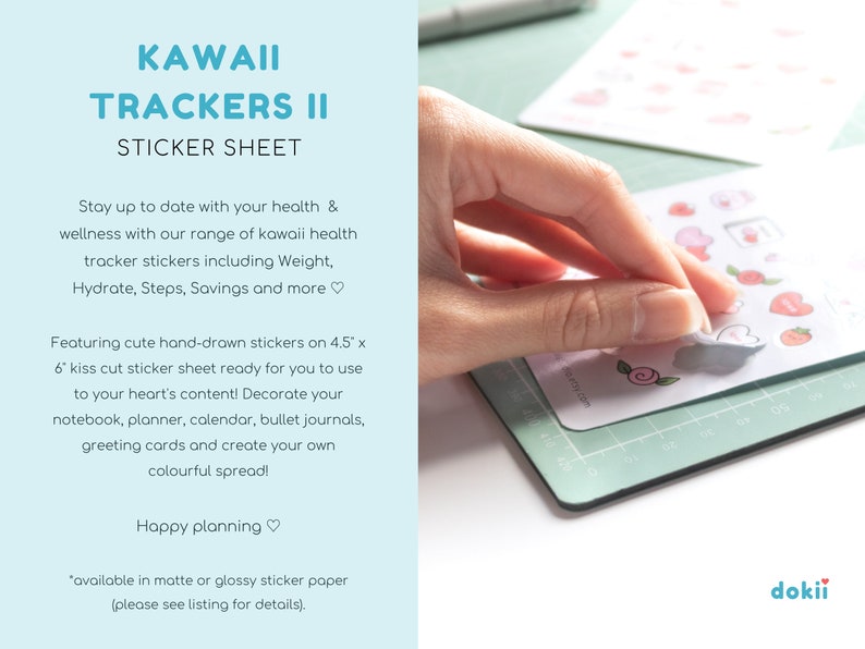 May include: A sticker sheet labelled "KAWAII TRACKERS II" featuring kawaii health tracker stickers. The sheet includes stickers for weight, hydration, steps, and savings. The hand-drawn stickers measure 11.4 cm x 15.2 cm.