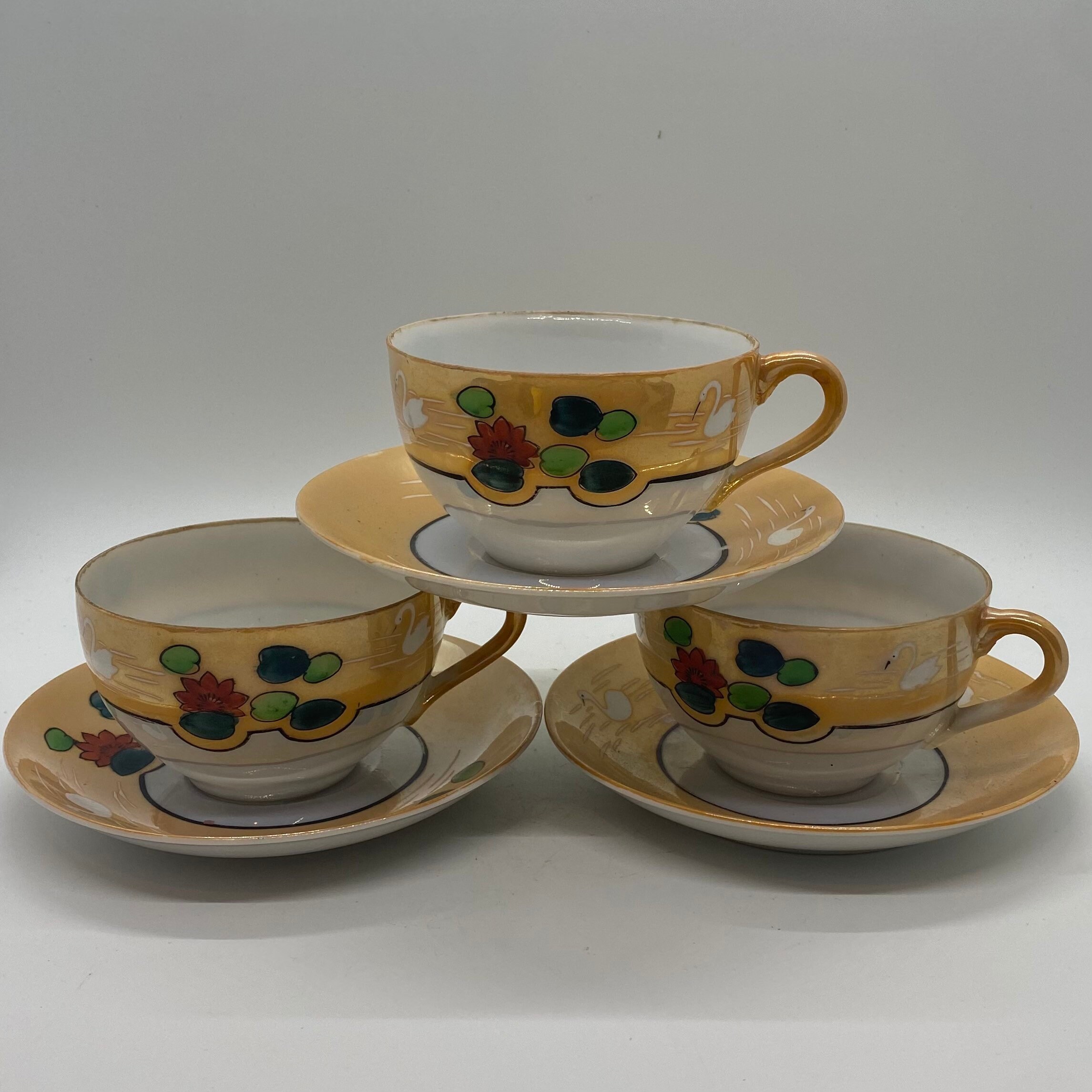 Vintage Lusterware Porcelain Tea Cup/Saucer Japan Peach & Blue Vintage Lusterware Porcelain Tea Cup/Saucer Japan Peach & Blue