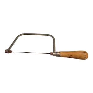 May include: A metal coping saw with a wooden handle. The saw has a U-shaped frame and a thin blade stretched between the ends. The handle is made of light brown wood.