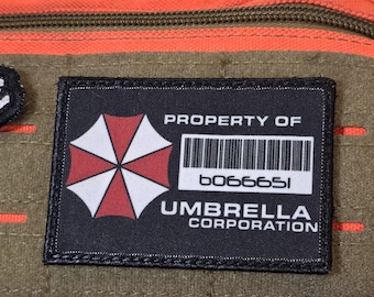 Property of Umbrella Corp – Funny Tactical Morale Patch | Custom Quote Patch | Hook & Loop Patch for Backpack, Vest, Hat, Gear