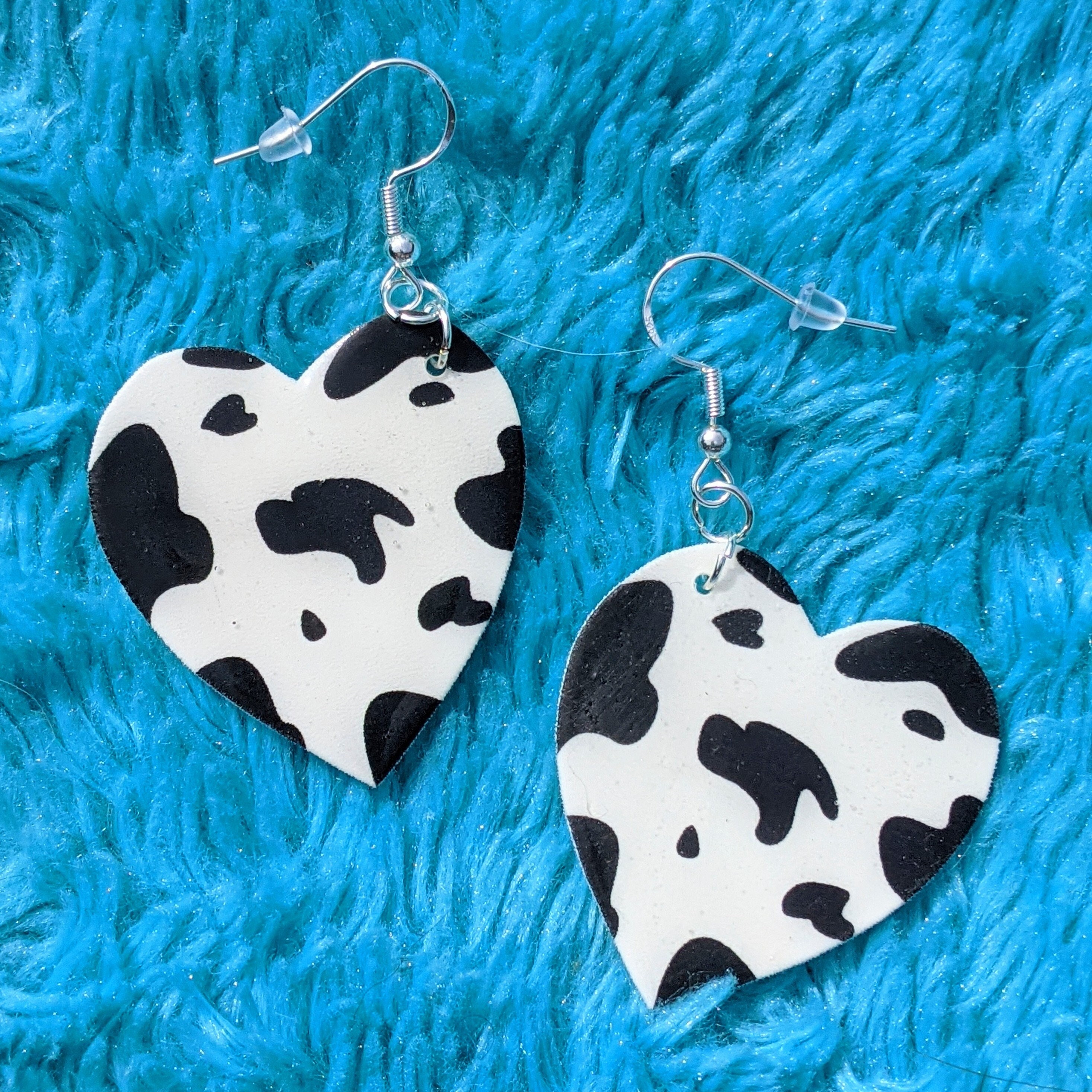 Cow print heart earrings deals