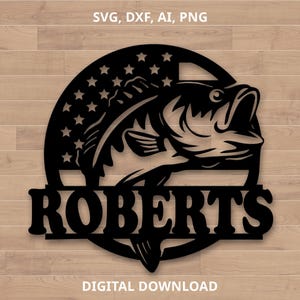 May include: Black and white silhouette of a bass fish jumping out of the water with an American flag in the background. The word "ROBERTS" is written in a banner below the fish.