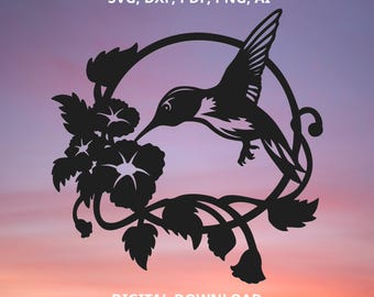 May include: Black silhouette of a hummingbird with its beak in a flower. The hummingbird is surrounded by a wreath of flowers and leaves. The image is set against a pink and purple gradient background. SVG, DXF, PDF, PNG, AI. DIGITAL DOWNLOAD.