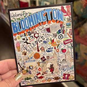 May include: A colorful postcard with the words "Welcome to Bloomington" in a whimsical font. The postcard is filled with illustrations of local businesses, landmarks, and icons, including a cardinal, a basketball, and a guitar.