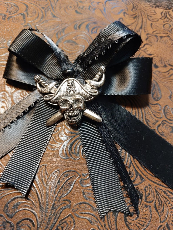 PrincessMadCreations Ribbon Bow W Skull Pirate Charm Brooch Pin, Bolo Tie, Creepy, Biker, Rockabilly, .