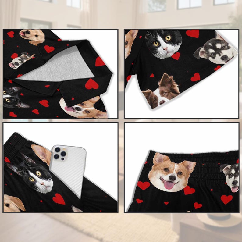 K&ouml;nnte beinhalten: Schwarzes Pyjama-Set mit einem Muster aus Hunde- und Katzenk&ouml;pfen und roten Herzen. Das Set besteht aus einem lang&auml;rmligen Oberteil und Shorts. Ein wei&szlig;es Smartphone befindet sich in der Hosentasche.