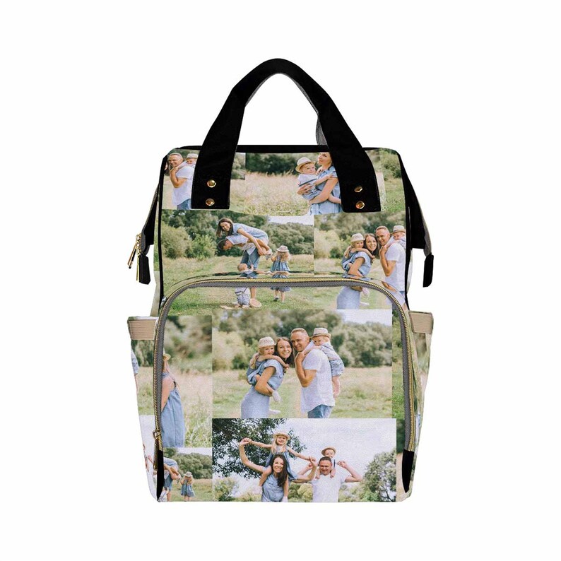 May include: A beige diaper bag with black straps and gold zippers. The bag is covered in a collage of photos of a family in a field.