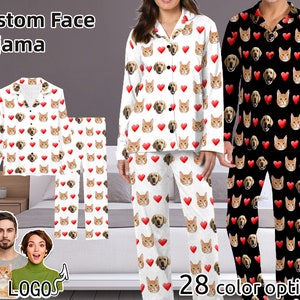 May include: Custom face pajama set with a white background and red hearts. The pajama top and pants feature a repeating pattern of a dog and cat face. The text "Custom Face Pajama" is at the top of the image. The text "28 color options" is at the bottom of the image.