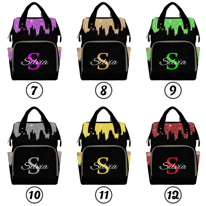 May include: Six black diaper bags with different glitter colors on the front. The bags have a gold zipper and a gold handle. The name "Silvia" is written on the front of each bag.