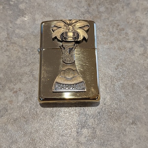 Zippo Barrett Smythe Champagne trick lighter in high polish brass
