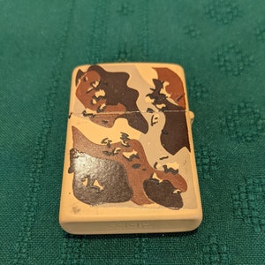Zippo Desert Shield Cigarette Lighter - Leonard Auction