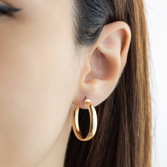 9 pairs hoop earrings - Gold-coloured - Ladies | H&M IN