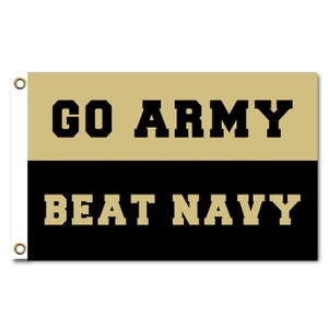 May include: A black and gold flag with the text "GO ARMY BEAT NAVY" in bold black letters.