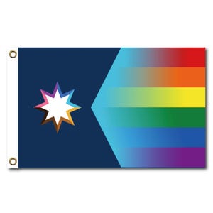 May include: A blue flag with a white seven-pointed star in the center and a rainbow stripe design in the upper right corner.