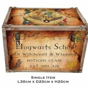 May include: A wooden storage trunk with a Hogwarts School of Witchcraft and Wizardry design. The trunk is decorated with a map of Hogwarts, the Hogwarts crest, and the words "Potions Class" and "Est 990 AD". The trunk measures 11.8 inches long, 7.9 inches wide, and 7.9 inches high.