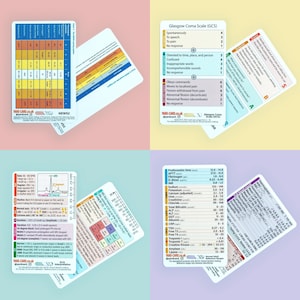 May include: A set of four white medical reference cards featuring printed charts and tables. The cards display the NEWS2 scoring system, Glasgow Coma Scale, SBAR communication tool, ECG interpretation guidelines, and various blood test reference ranges.