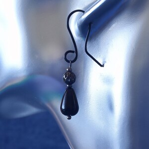 Onyx Earrings Closeup. 
Healing Crystal Jewelry / Gemstone Jewelry / Gothic Pagan Wicca Wiccan onyx jewelry	gemstone earrings	gemstone jewelry  gothic earrings	witchy earrings Pagan Jewelry wiccan jewelry